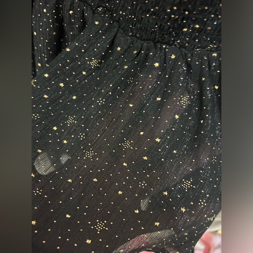 A beautiful black and gold dress
